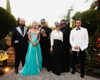 Karan Johar, Manish Malhotra, Karisma Kapoor with Anant Ambani and Radhika Merchant.