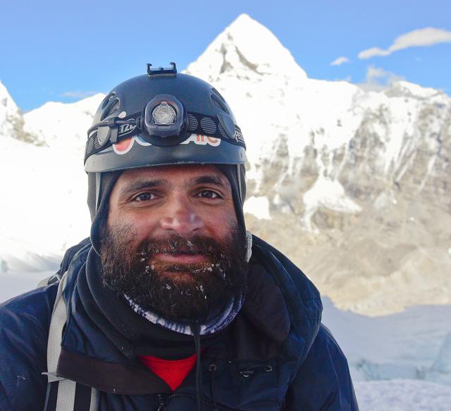 When Joisher returned to Everest three years after his first summit, he replaced his feathered down suit with one made of recycled plastic and reclaimed fishing nets. (Courtesy Kuntal Joisher)