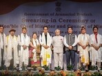 Arunachal Pradesh Governor KT Parnaik in picture with the newly sworn state Chief Minister Pema Khandu and his Cabinet ministers during a swearing-in ceremony, in Itanagar on Thursday. Arunachal Pradesh Governor KT Parnaik in picture with the newly sworn state Chief Minister Pema Khandu and his Cabinet ministers during a swearing-in ceremony, in Itanagar on Thursday.