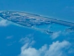 Chinese structures and buildings on the man-made Fiery Cross Reef at the Spratlys group of islands in the South China Sea .