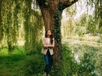  In this undated handout photo issued by Kensington Palace, Catherine, Princess of Wales stands under a tree in Windsor, England. 