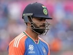 India's Virat Kohli reacts as he walks off the field after losing his wicket during the ICC Men's T20 World Cup cricket match between United States and India