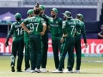 Pakistan's Imad Wasim, third right, celebrates with teammates after the run-out of Canada's Nicholas Kirton during the ICC Men's T20 World Cup Pakistan's Imad Wasim, third right, celebrates with teammates after the run-out of Canada's Nicholas Kirton during the ICC Men's T20 World Cup