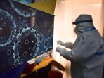 An illustration of the novel coronavirus at a Covid-19 testing centre in New Delhi. (Sanchit Khanna / HT Photo)