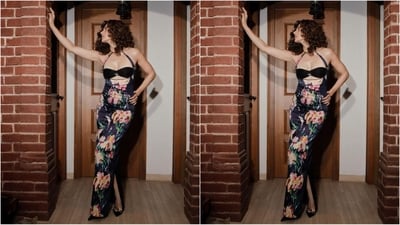 Her outfit is from the shelves of the fashion brand Taali and features a halter neckline, black bralette top, and a high-waisted skirt adorned with a multicoloured floral digital print, exuding glamour. The bodycon fit perfectly hugs her figure, and a side slit adds extra oomph. (Instagram/@taapsee) Her outfit is from the shelves of the fashion brand Taali and features a halter neckline, black bralette top, and a high-waisted skirt adorned with a multicoloured floral digital print, exuding glamour. The bodycon fit perfectly hugs her figure, and a side slit adds extra oomph. (Instagram/@taapsee)