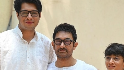 Bollywood actor Aamir Khan (C) with his sons Junaid Khan (L) and Azad Khan (R) celebrate Eid al-Fitr which marks the end of the holy Muslim fasting month of Ramadan, in Mumbai on April 11, 2024. (Photo by SUJIT JAISWAL / AFP) (AFP)
