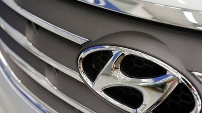 The logo of Hyundai Motor is seen on a car displayed at a Hyundai dealership in Seoul. (Reuters)