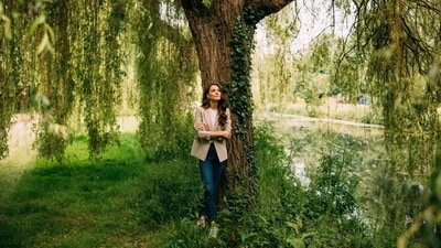 In this undated handout photo issued by Kensington Palace, Catherine, Princess of Wales stands under a tree in Windsor, England. In this undated handout photo issued by Kensington Palace, Catherine, Princess of Wales stands under a tree in Windsor, England.