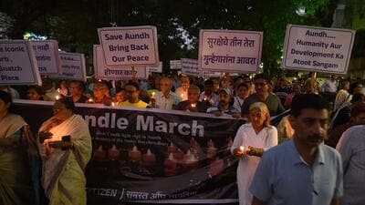 Residents participated in a candle march in Aundh on Saturday evening. (MAHENDRA KOLHE/HT PHOTO)