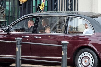 Prince Louis seen with Kate arriving at Buckingham Palace/ (Getty) Prince Louis seen with Kate arriving at Buckingham Palace/ (Getty)