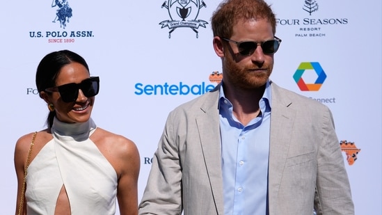 FILE - Britain's Prince Harry, right, and wife Meghan Markle, Duchess of Sussex, arrive for the 2024 Royal Salute Polo Challenge to Benefit Sentebale, on April 12, 2024, in Wellington, Fla. Prince Harry’s fight for police protection in the U.K. has received another setback. A judge on Monday, April 15, 2024 rejected his request to appeal an earlier ruling upholding a government panel’s decision to limit his access to publicly funded security after he quit as a working member of the royal family. (AP Photo/Rebecca Blackwell, File) (AP)