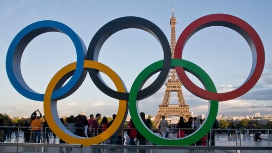 The Olympic rings are set up at Trocadero plaza that overlooks the Eiffel Tower in Paris (AP)