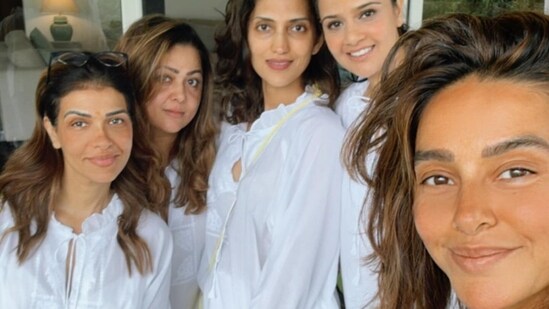 Shibani Dandekar, Amrita Arora and others also struck a pose as they wore matching white pyjama sets. The photo was likely from a meditation or yoga session.