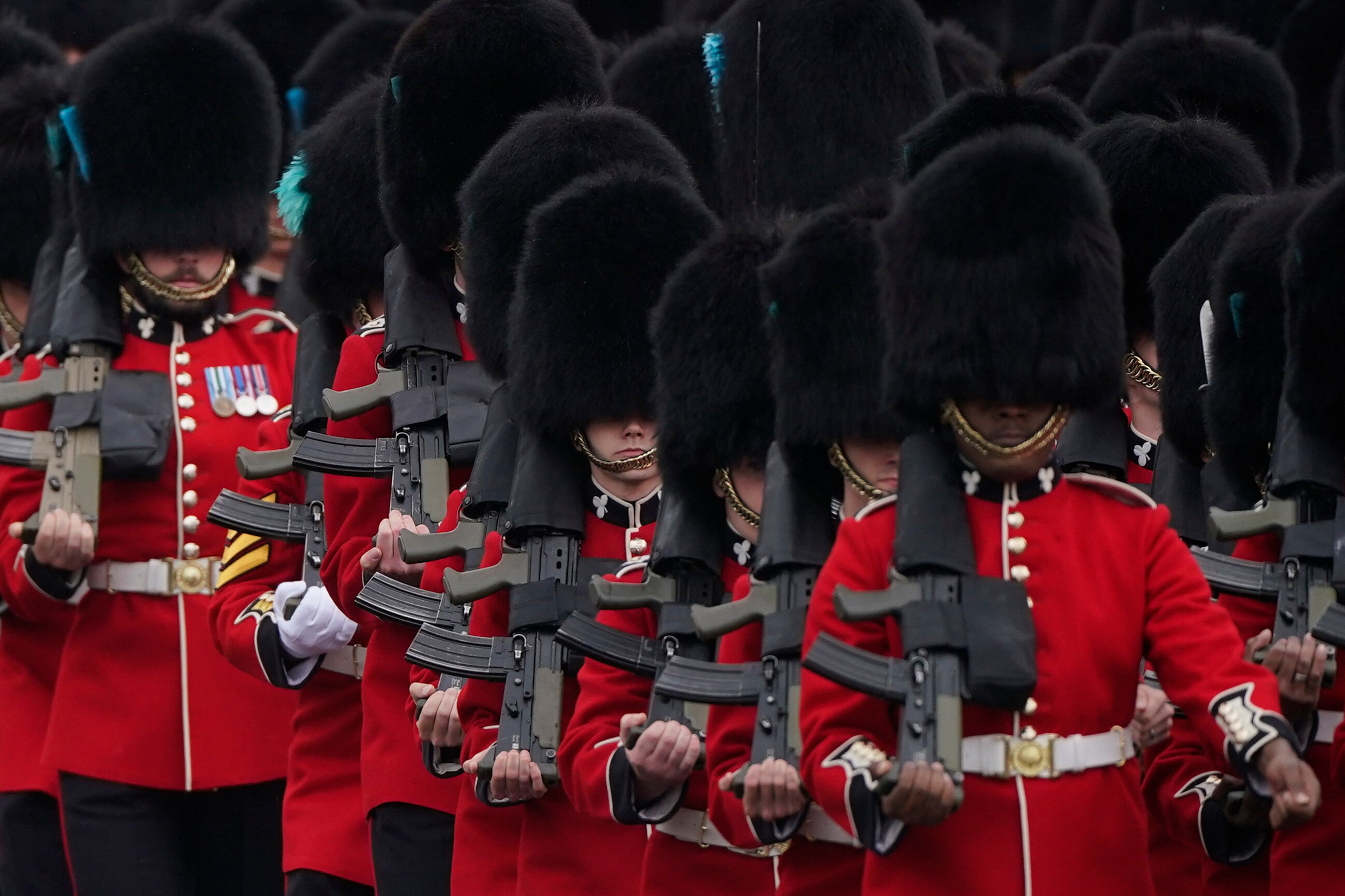Soldiers from the Irish Guards march along the Mall as they take part in the Trooping the Color ceremony, in London, Saturday, June 15, 2024. Trooping the Color is the King's Birthday Parade and one of the nation's most impressive and iconic annual events attended by almost every member of the Royal Family. (AP Photo/Alberto Pezzali) (AP) Soldiers from the Irish Guards march along the Mall as they take part in the Trooping the Color ceremony, in London, Saturday, June 15, 2024. Trooping the Color is the King's Birthday Parade and one of the nation's most impressive and iconic annual events attended by almost every member of the Royal Family. (AP Photo/Alberto Pezzali) (AP)