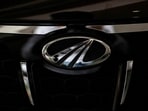 The logo of Mahindra & Mahindra is seen on a car at a showroom in Mumbai (Reuters)