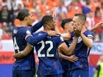 Netherlands' Virgil van Dijk, Denzel Dumfries and teammates celebrate after the match 
