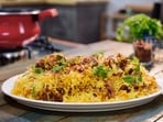 Make Hyderabadi Mutton Biriyani at home with this easy recipe.
