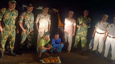 Border Security Force (BSF) and Assam police arrest two drug peddlers in Karimganj’s Ramkrishna Nagar on Saturday night. (HT Photo/Sourced) Border Security Force (BSF) and Assam police arrest two drug peddlers in Karimganj’s Ramkrishna Nagar on Saturday night. (HT Photo/Sourced)