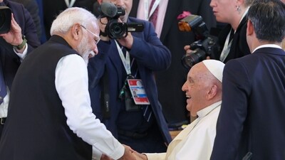 Pope Francis greets Prime Minister Narendra Modi as he arrives for a session during the G7 Summit, in Savelletri Di Fasano, Italy, Friday, June 14, 2024. (PTI Photo) Pope Francis greets Prime Minister Narendra Modi as he arrives for a session during the G7 Summit, in Savelletri Di Fasano, Italy, Friday, June 14, 2024. (PTI Photo)