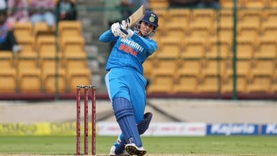Smriti Mandhana plays a shot during the first women's ODI cricket match between India and South Africa at M. Chinnaswamy Stadium (PTI) Smriti Mandhana plays a shot during the first women's ODI cricket match between India and South Africa at M. Chinnaswamy Stadium (PTI)