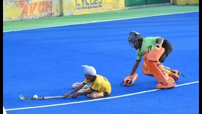 Players in action during the 14th Olympian Prithipal Singh Hockey Festival in Ludhiana on Sunday. (HT Photo) Players in action during the 14th Olympian Prithipal Singh Hockey Festival in Ludhiana on Sunday. (HT Photo)