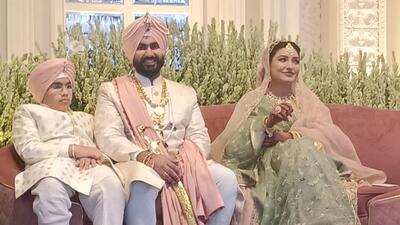 Punjab cabinet minister Anmol Gagan Maan and advocate Shahbaaz Singh Sohi during their wedding function in Zirakpur on Sunday. (HT Photo) Punjab cabinet minister Anmol Gagan Maan and advocate Shahbaaz Singh Sohi during their wedding function in Zirakpur on Sunday. (HT Photo)