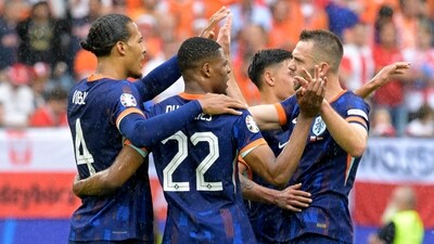 Netherlands' Virgil van Dijk, Denzel Dumfries and teammates celebrate after the match (REUTERS)