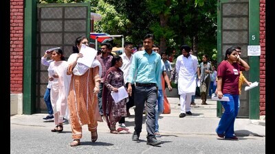 Students coming out of an examination centre in Ludhiana on Sunday. (Manish/HT) Students coming out of an examination centre in Ludhiana on Sunday. (Manish/HT)