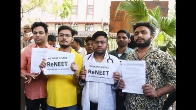 Students holding placards protest against the alleged irregularities in the NEET examination, at Shashtri Bhawan in New Delhi on Friday. (ANI Photo/Amit Sharma) (Amit Sharma) Students holding placards protest against the alleged irregularities in the NEET examination, at Shashtri Bhawan in New Delhi on Friday. (ANI Photo/Amit Sharma) (Amit Sharma)