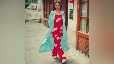 Aditi accessorised the ensemble with minimal additions, including chunky white sneakers and dainty earrings. For makeup, she went for feathered brows, a minimal base, blushed cheeks, and a light pink lip tint. Centre-parted loose tresses rounded off her holiday look. (Instagram) Aditi accessorised the ensemble with minimal additions, including chunky white sneakers and dainty earrings. For makeup, she went for feathered brows, a minimal base, blushed cheeks, and a light pink lip tint. Centre-parted loose tresses rounded off her holiday look. (Instagram)