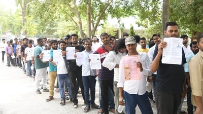 Candidates had to carry their admit cards to and a valid ID card with their photograph on it ( Photo by Santosh Kumar) Candidates had to carry their admit cards to and a valid ID card with their photograph on it ( Photo by Santosh Kumar)