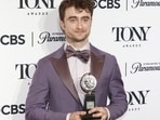 Daniel Radcliffe poses with the award for Best Performance by a Featured Actor in a Musical for "Merrily We Roll Along" at the 77th Annual Tony Awards in New York City, U.S., June 16, 2024. REUTERS/Eduardo Munoz