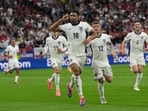 England's Jude Bellingham celebrates after scoring the opening goal during a Group C match between Serbia and England at the Euro 2024 soccer tournament in Gelsenkirchen, Germany, Sunday, June 16, 2024. (AP Photo/Martin Meissner)