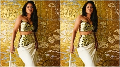 Her stunning outfit boasts an off-shoulder sweetheart neckline, a striking cut at the midriff, and a wrapped white bottom that added an extra touch of oomph to her look. Each piece of her ensemble was meticulously crafted to fit and accentuate every curve, transforming her into a true work of art. (Instagram) Her stunning outfit boasts an off-shoulder sweetheart neckline, a striking cut at the midriff, and a wrapped white bottom that added an extra touch of oomph to her look. Each piece of her ensemble was meticulously crafted to fit and accentuate every curve, transforming her into a true work of art. (Instagram)