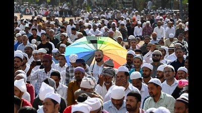 A Muslim devotee takes cover under an umbrella at Jama Masjid in Sector 20, Chandigarh, on Monday. (Ravi Kumar/HT) A Muslim devotee takes cover under an umbrella at Jama Masjid in Sector 20, Chandigarh, on Monday. (Ravi Kumar/HT)