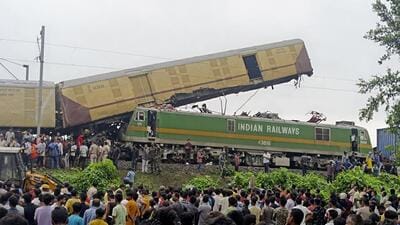 A cargo train rammed into Kanchanjunga Express near New Jalpaiguri station in West Bengal on Monday. (AP) A cargo train rammed into Kanchanjunga Express near New Jalpaiguri station in West Bengal on Monday. (AP)
