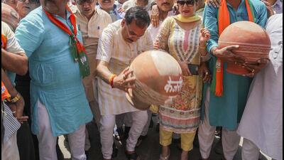 Delhi BJP chief Virendra Sachdeva during a protest against the Delhi government over the ongoing water crisis in the national capital at Geeta Colony in East Delhi on Monday. (PTI) Delhi BJP chief Virendra Sachdeva during a protest against the Delhi government over the ongoing water crisis in the national capital at Geeta Colony in East Delhi on Monday. (PTI)