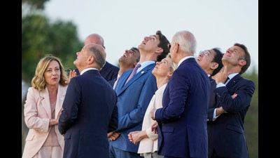 FILE - From right, French President Emmanuel Macron, Japan's Prime Minister Fumio Kishida, U.S. President Joe Biden, European Commission President Ursula von der Leyen, Canada's Prime Minister Justin Trudeau, Britain's Prime Minister Rishi Sunak, European Council President Charles Michel, German Chancellor Olaf Scholz and Italian Prime Minister Giorgia Meloni watch a skydiving demo during the G7 world leaders summit at Borgo Egnazia, Italy, Thursday, June 13, 2024. The 27 leaders of the European Union will gather in Brussels on Monday, June 17, 2024 to take stock of the surprise European election results and begin the fraught process of dividing up the bloc's top jobs, but they will be playing their usual political game with a deck of reshuffled cards. (AP Photo/Luca Bruno, File) (AP) FILE - From right, French President Emmanuel Macron, Japan's Prime Minister Fumio Kishida, U.S. President Joe Biden, European Commission President Ursula von der Leyen, Canada's Prime Minister Justin Trudeau, Britain's Prime Minister Rishi Sunak, European Council President Charles Michel, German Chancellor Olaf Scholz and Italian Prime Minister Giorgia Meloni watch a skydiving demo during the G7 world leaders summit at Borgo Egnazia, Italy, Thursday, June 13, 2024. The 27 leaders of the European Union will gather in Brussels on Monday, June 17, 2024 to take stock of the surprise European election results and begin the fraught process of dividing up the bloc's top jobs, but they will be playing their usual political game with a deck of reshuffled cards. (AP Photo/Luca Bruno, File) (AP)