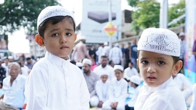 At the Light House Hill Road mosque in Mangaluru, children greet each other after their morning prayers for Eid Ul Adha. (PTI) At the Light House Hill Road mosque in Mangaluru, children greet each other after their morning prayers for Eid Ul Adha. (PTI)
