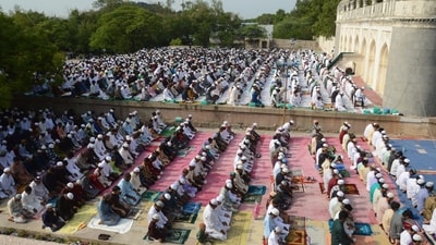 At an Eidgah in Hyderabad, Muslim devotees offered their morning prayers and marked the festivities. (PTI) At an Eidgah in Hyderabad, Muslim devotees offered their morning prayers and marked the festivities. (PTI)