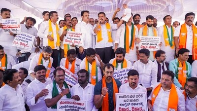 Bengaluru: BJP leaders and workers during a protest against the Karnataka government over price rise of essential commodities at Freedom Park. (PTI) Bengaluru: BJP leaders and workers during a protest against the Karnataka government over price rise of essential commodities at Freedom Park. (PTI)