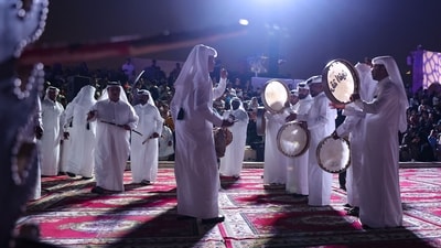 At Katara Cultural Village in the Qatari capital Doha, musicians performed to mark the festivities of the first day of the Muslim holiday of Eid al-Adha. (Karim JAAFAR / AFP) At Katara Cultural Village in the Qatari capital Doha, musicians performed to mark the festivities of the first day of the Muslim holiday of Eid al-Adha. (Karim JAAFAR / AFP)
