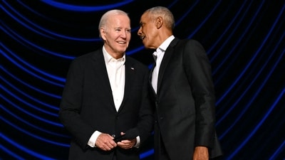 Former President, Barack Obama guides US President Joe Biden after he froze on stage during the L.A. Fundraiser at Peacock Theater, L.A., June 15, 2024. (Photo by Mandel NGAN / AFP) (AFP) Former President, Barack Obama guides US President Joe Biden after he froze on stage during the L.A. Fundraiser at Peacock Theater, L.A., June 15, 2024. (Photo by Mandel NGAN / AFP) (AFP)