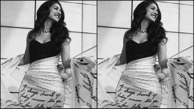 On Sunday, Rhea Kapoor treated fashion lovers by sharing a series of pictures of Radhika on Instagram accompanied by the caption, “The love letter, recreating the brides letter to the groom on lengths of French chiffon incrusted with crystals.” In the post she can be seen donning a stunning custom made gown by Robert Wun, a London based designer. (Instagram/@rheakapoor) On Sunday, Rhea Kapoor treated fashion lovers by sharing a series of pictures of Radhika on Instagram accompanied by the caption, “The love letter, recreating the brides letter to the groom on lengths of French chiffon incrusted with crystals.” In the post she can be seen donning a stunning custom made gown by Robert Wun, a London based designer. (Instagram/@rheakapoor)