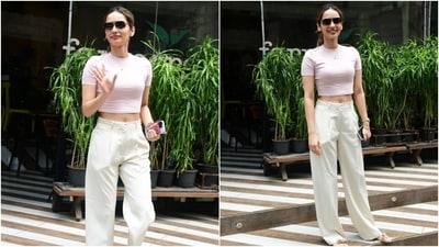 Manushi Chhillar was a picture of comfort as she stepped out for a lunch date in a cropped top and white cargo pants. The former Miss World styled the ensemble with bow-adorned ballet shoes, sunglasses, bracelets, and a centre-parted ponytail. (Instagram) Manushi Chhillar was a picture of comfort as she stepped out for a lunch date in a cropped top and white cargo pants. The former Miss World styled the ensemble with bow-adorned ballet shoes, sunglasses, bracelets, and a centre-parted ponytail. (Instagram)