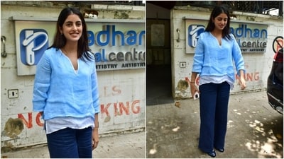 Navya Nanda channelled the girl-next-door look for her outing today. She wore a white and blue-coloured short kurta with dark blue flared denim jeans. She styled the ensemble with ballet shoes, earrings, a dainty necklace, a no-makeup look, and centre-parted loose locks. (Instagram) Navya Nanda channelled the girl-next-door look for her outing today. She wore a white and blue-coloured short kurta with dark blue flared denim jeans. She styled the ensemble with ballet shoes, earrings, a dainty necklace, a no-makeup look, and centre-parted loose locks. (Instagram)