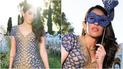 The gown, featuring intricate details in golden and blue embellishments, featured a V-neckline, pleated patterns at the waist and a thigh-high slit. In a sleek gold and diamond necklace, matching earrings and a pearl bracelet, Shloka minimally accessorised her look. (Instagram/@dmjatia) The gown, featuring intricate details in golden and blue embellishments, featured a V-neckline, pleated patterns at the waist and a thigh-high slit. In a sleek gold and diamond necklace, matching earrings and a pearl bracelet, Shloka minimally accessorised her look. (Instagram/@dmjatia)