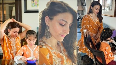 Today, Soha Ali Khan celebrated Eid ul Adha with her daughter. For the celebrations, the mother-daughter duo chose to twin in beautiful orange suits adorned with intricate white kadhai. Soha accessorised her suit with jhumkis, a pink lip shade, matching eye shadow, and mascara-adorned lashes. (Instagram) Today, Soha Ali Khan celebrated Eid ul Adha with her daughter. For the celebrations, the mother-daughter duo chose to twin in beautiful orange suits adorned with intricate white kadhai. Soha accessorised her suit with jhumkis, a pink lip shade, matching eye shadow, and mascara-adorned lashes. (Instagram)