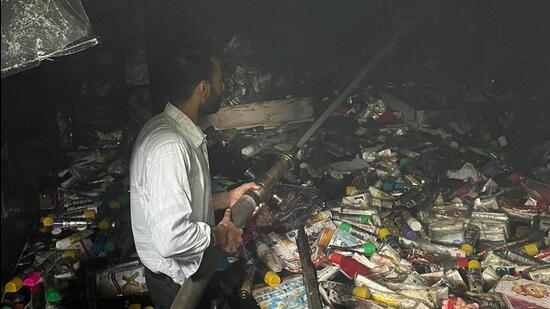 Using over 20 fire tenders, firefighters battled the flames for 16 hours to douse the inferno that officials said was suspected to have been caused by a short-circuit. (HT Photo)