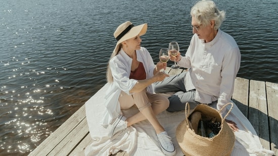 Lakeside escape: Get away from the hustle and bustle of the city with a peaceful lunch by the lake. Before settling on a quiet spot on the shore, hire a canoe or pedal boat and explore the tranquil waterways together. Pack a picnic basket with light fare such as crisp salads, finger sandwiches and rich chocolates. Add soft blankets, fragrant flowers and perhaps a small keepsake to make the occasion even more special. (Pexels)